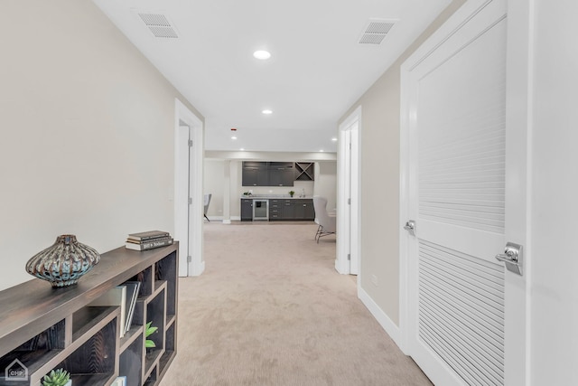 4920 Stonewall Ave, Downers Grove, IL 60515 - hallway with light carpet, recessed lighting, and baseboards