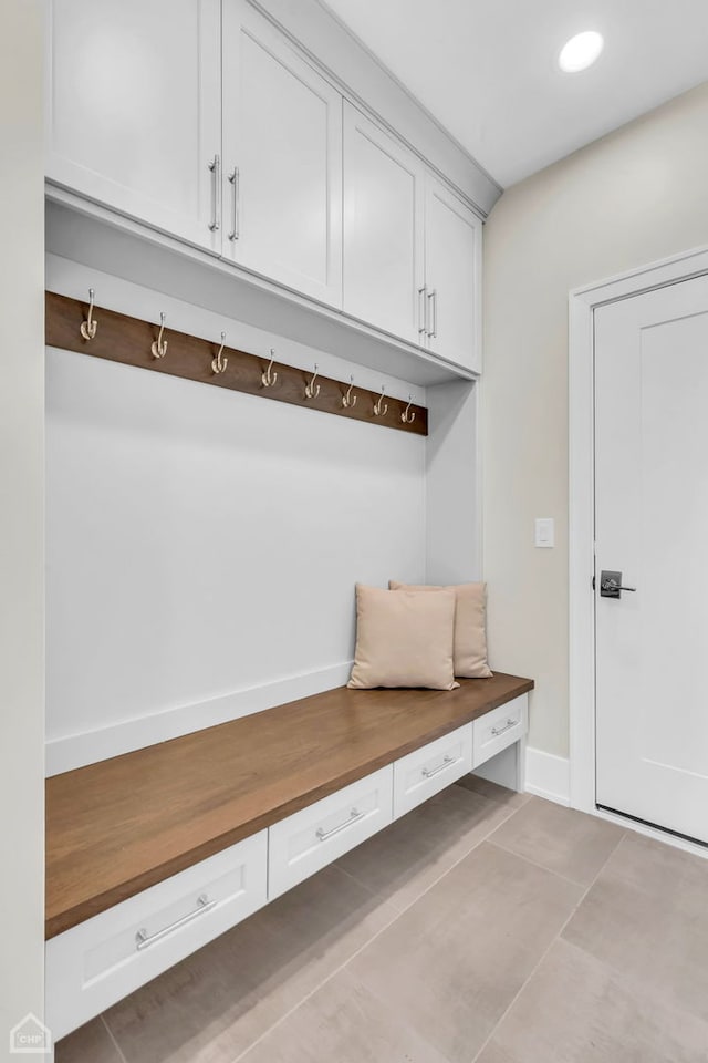 4920 Stonewall Ave, Downers Grove, IL 60515 - mudroom featuring baseboards and light tile patterned flooring