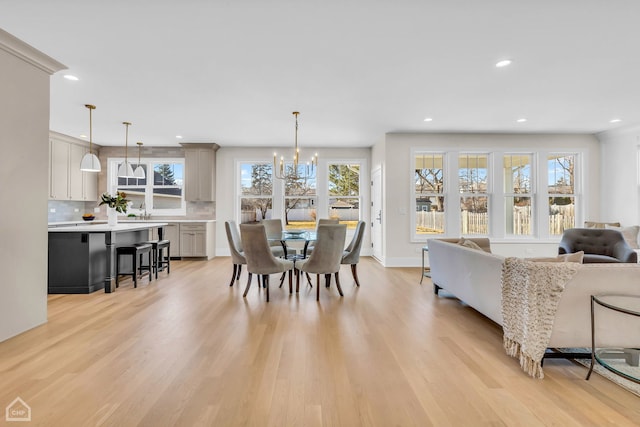 4920 Stonewall Ave, Downers Grove, IL 60515 - dining area with recessed lighting, light wood finished floors, a chandelier, and baseboards