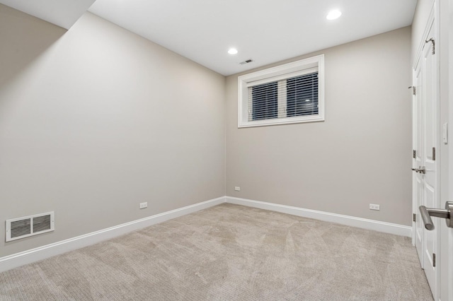 2004 W Erie St Unit 1W, Chicago, IL 60612 - unfurnished room featuring light carpet, baseboards, and recessed lighting