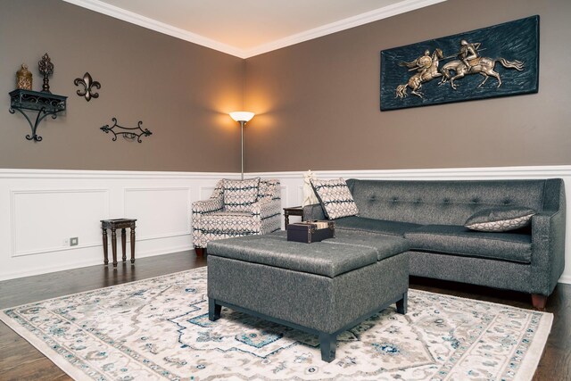 406 Elderberry Ln, Streamwood, IL 60107 - living room featuring wood finished floors, ornamental molding, a wainscoted wall, and a decorative wall