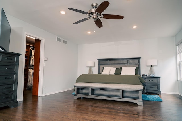 406 Elderberry Ln, Streamwood, IL 60107 - bedroom with a walk in closet, baseboards, wood finished floors, recessed lighting, and a ceiling fan