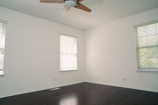 406 Elderberry Ln, Streamwood, IL 60107 - empty room with ceiling fan, dark wood-type flooring, and baseboards
