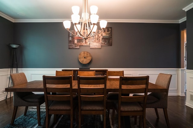 406 Elderberry Ln, Streamwood, IL 60107 - dining area featuring wood finished floors, crown molding, a wainscoted wall, a chandelier, and a decorative wall