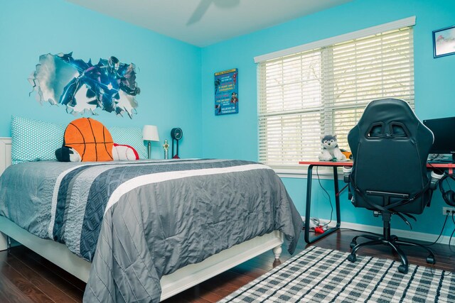406 Elderberry Ln, Streamwood, IL 60107 - bedroom with multiple windows, wood finished floors, and a desk