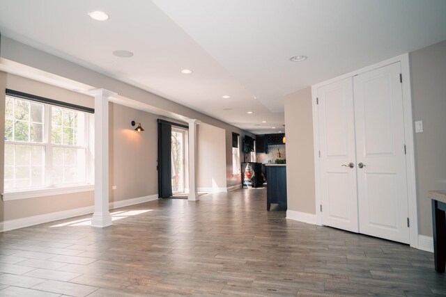 406 Elderberry Ln, Streamwood, IL 60107 - unfurnished living room with wood finished floors, recessed lighting, and baseboards