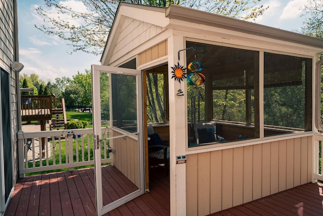 406 Elderberry Ln, Streamwood, IL 60107 - wooden terrace with a sunroom and stairs