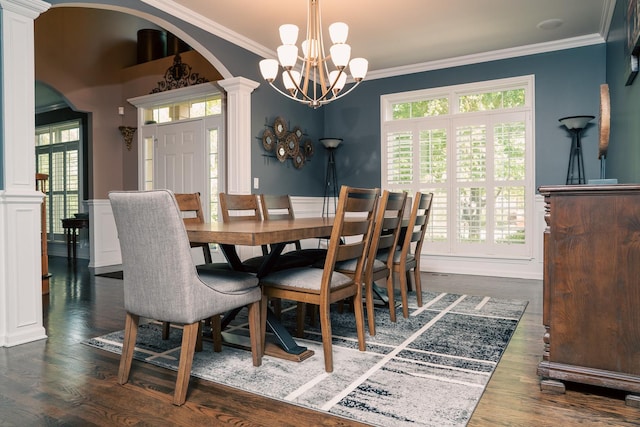 406 Elderberry Ln, Streamwood, IL 60107 - dining area with ornate columns, arched walkways, a chandelier, ornamental molding, and dark wood finished floors