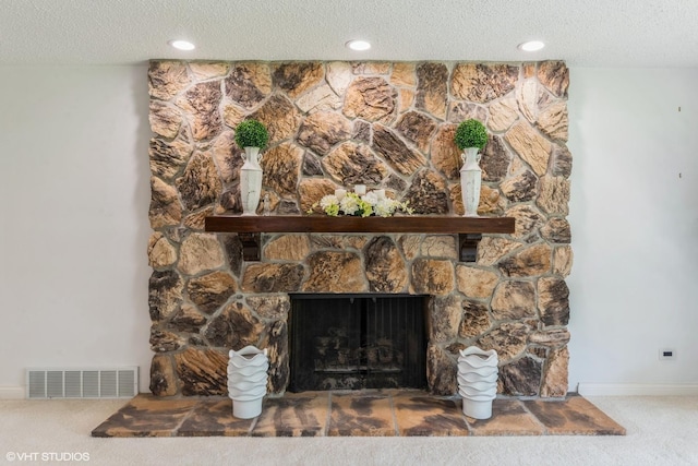 37782 N Cedar Lake Rd, Lake Villa, IL 60046 - detailed view of carpet floors, a textured ceiling, a stone fireplace, and recessed lighting