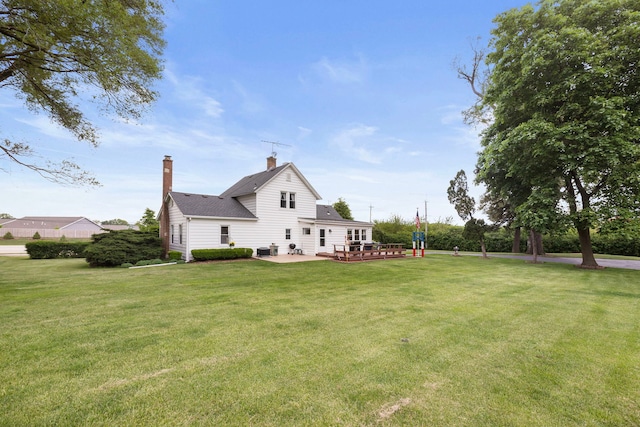 30W311 W Bartlett Rd, Bartlett, IL 60103 - view of grassy yard featuring central AC unit and a deck