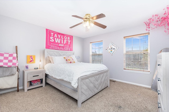 1014 Bayside Ln, Shorewood, IL 60404 - bedroom with light carpet, baseboards, and ceiling fan