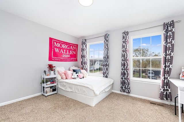 1014 Bayside Ln, Shorewood, IL 60404 - carpeted bedroom with baseboards