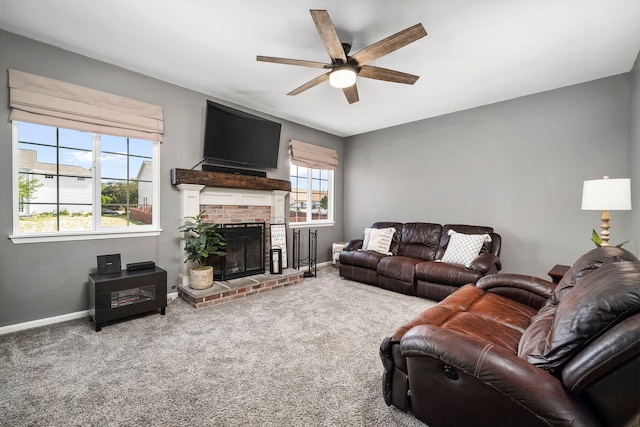 1014 Bayside Ln, Shorewood, IL 60404 - living area with a ceiling fan, baseboards, a fireplace, and carpet flooring