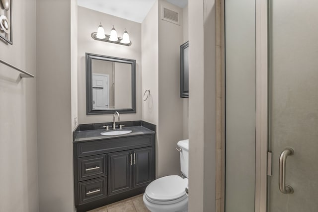 25 E Superior St Unit 903, Chicago, IL 60611 - full bath with vanity, toilet, a shower stall, and tile patterned flooring
