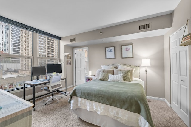 25 E Superior St Unit 903, Chicago, IL 60611 - carpeted bedroom with baseboards and an office area