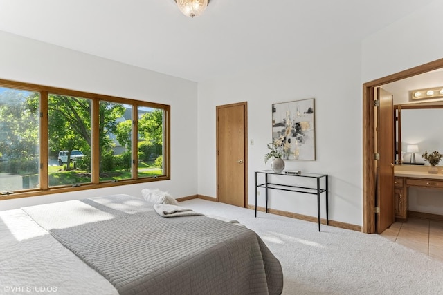 3 Lake Katherine Dr Unit 0, Palos Heights, IL 60463 - bedroom featuring light colored carpet, baseboards, and ensuite bathroom