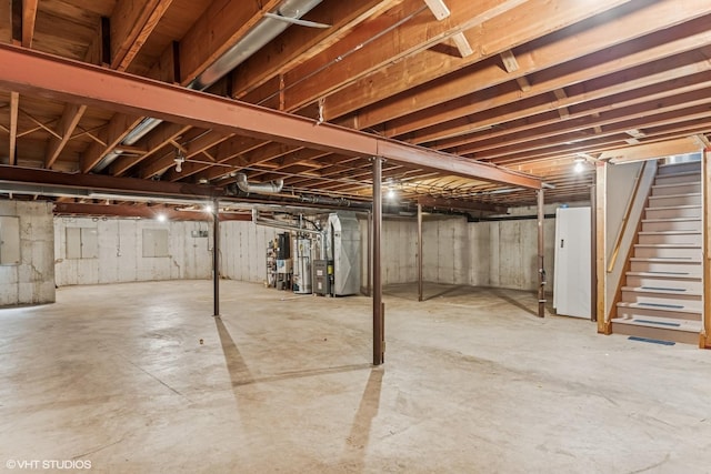 3 Lake Katherine Dr Unit 0, Palos Heights, IL 60463 - unfinished below grade area with stairs, heating unit, and freestanding refrigerator