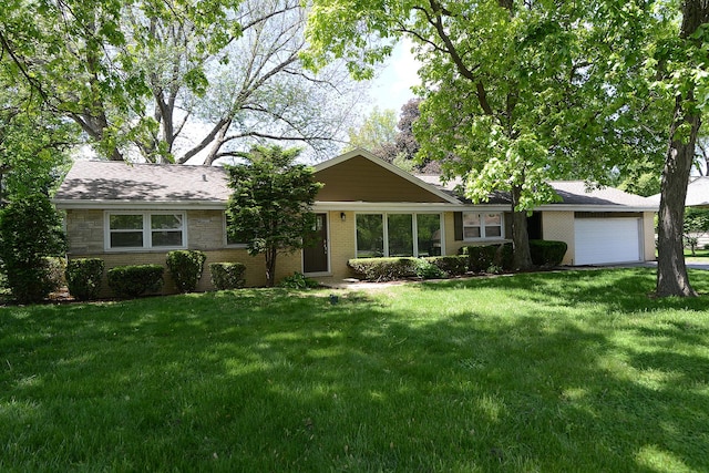 6N002 Laurel Dr, Medinah, IL 60157 - ranch-style house with a garage, a front lawn, and brick siding