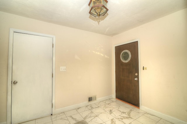 6N002 Laurel Dr, Medinah, IL 60157 - spare room with light marble finish flooring and baseboards