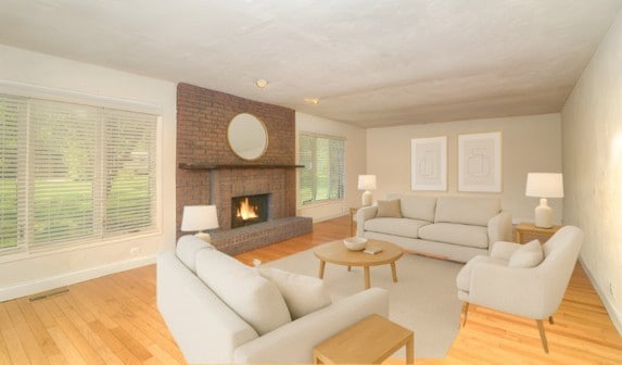 6N002 Laurel Dr, Medinah, IL 60157 - living area featuring wood finished floors, a fireplace, and baseboards