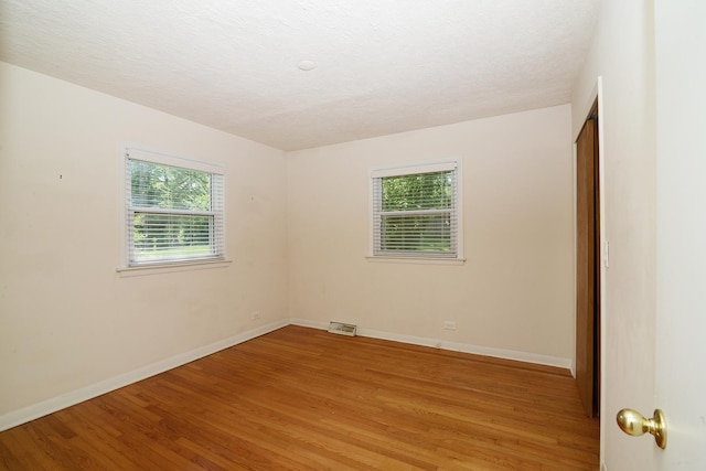 6N002 Laurel Dr, Medinah, IL 60157 - empty room featuring light wood-style flooring and baseboards