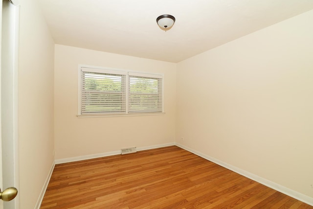 6N002 Laurel Dr, Medinah, IL 60157 - spare room with light wood-style floors and baseboards