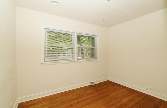 6N002 Laurel Dr, Medinah, IL 60157 - unfurnished room with wood finished floors, baseboards, and recessed lighting