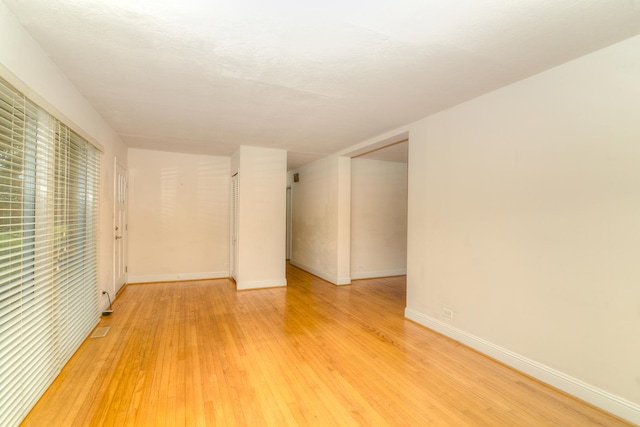 6N002 Laurel Dr, Medinah, IL 60157 - unfurnished room with light wood-style flooring and baseboards