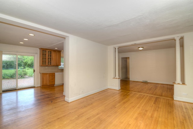 6N002 Laurel Dr, Medinah, IL 60157 - empty room featuring ornate columns, light wood-style flooring, baseboards, and recessed lighting