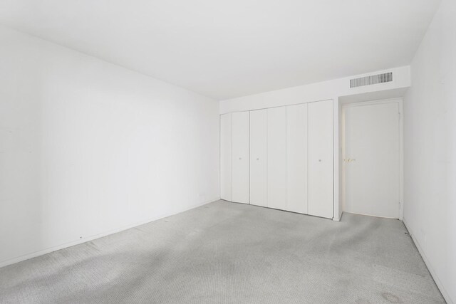 6033 N Sheridan Rd Unit 8E, Chicago, IL 60660 - unfurnished bedroom featuring carpet flooring and a closet