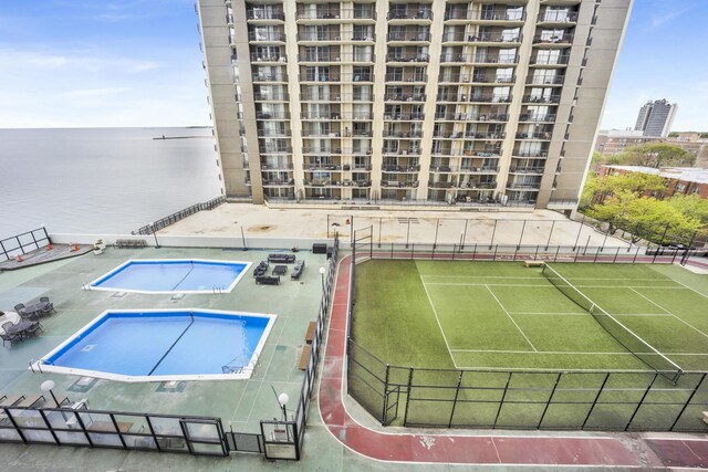 6033 N Sheridan Rd Unit 8E, Chicago, IL 60660 - view of pool with a water view and a tennis court