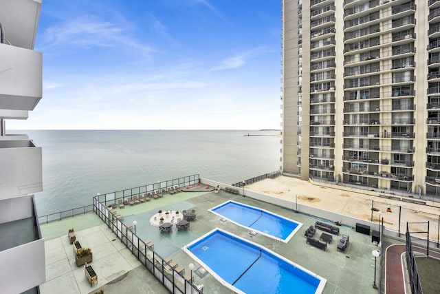 6033 N Sheridan Rd Unit 8E, Chicago, IL 60660 - community pool featuring a water view and a patio area