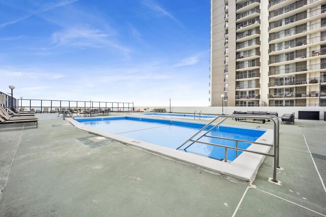 6033 N Sheridan Rd Unit 8E, Chicago, IL 60660 - community pool featuring a patio area