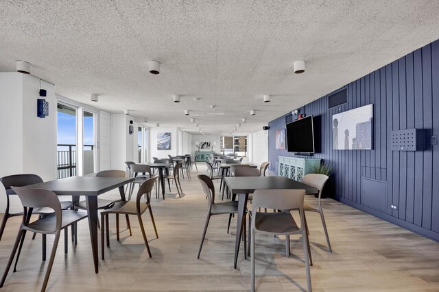6033 N Sheridan Rd Unit 8E, Chicago, IL 60660 - dining space featuring light wood finished floors
