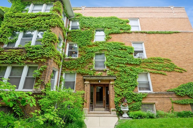 1458 W Argyle St Unit 1N, Chicago, IL 60640 - view of front of home featuring brick siding