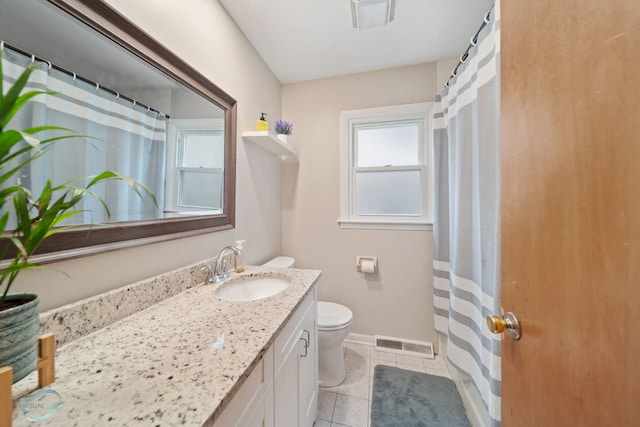 5317 Benton Ave, Downers Grove, IL 60515 - full bath with toilet, vanity, tile patterned flooring, and baseboards