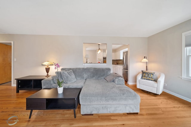 5317 Benton Ave, Downers Grove, IL 60515 - living area featuring baseboards and light wood-style flooring