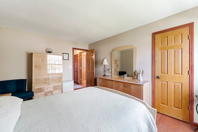 1585 Woodcutter Ln Unit D, Wheaton, IL 60189 - bedroom featuring light wood-style floors