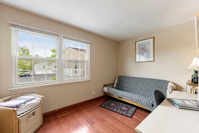 1585 Woodcutter Ln Unit D, Wheaton, IL 60189 - home office with hardwood / wood-style flooring and baseboards