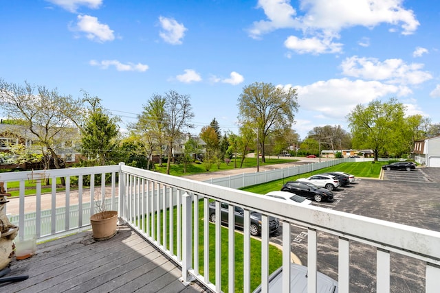 1585 Woodcutter Ln Unit D, Wheaton, IL 60189 - wooden deck with a residential view and a lawn