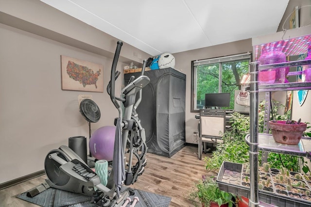 14028 Laramie Ave Unit 1719, Crestwood, IL 60418 - workout area featuring wood finished floors and baseboards