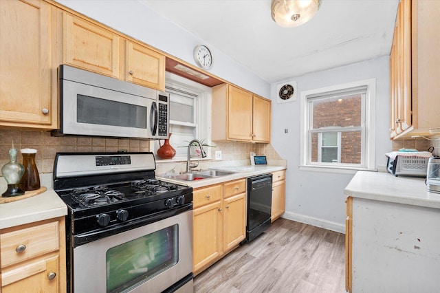 9141 S Albany Ave S, Evergreen Park, IL 60805 - kitchen with stainless steel appliances, a sink, and light brown cabinetry