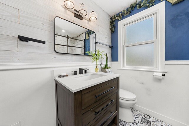 9141 S Albany Ave S, Evergreen Park, IL 60805 - bathroom featuring vanity, toilet, baseboards, a shower, and wood walls