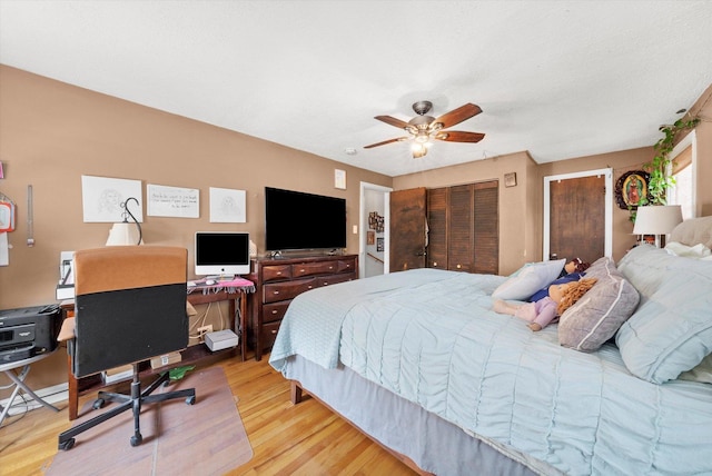 9141 S Albany Ave S, Evergreen Park, IL 60805 - bedroom with wood finished floors, a ceiling fan, and an office area