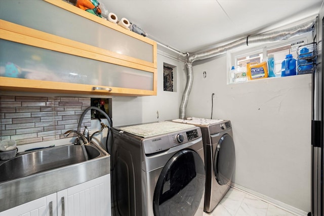 9141 S Albany Ave S, Evergreen Park, IL 60805 - laundry area featuring light marble finish flooring, washing machine and clothes dryer, and cabinet space