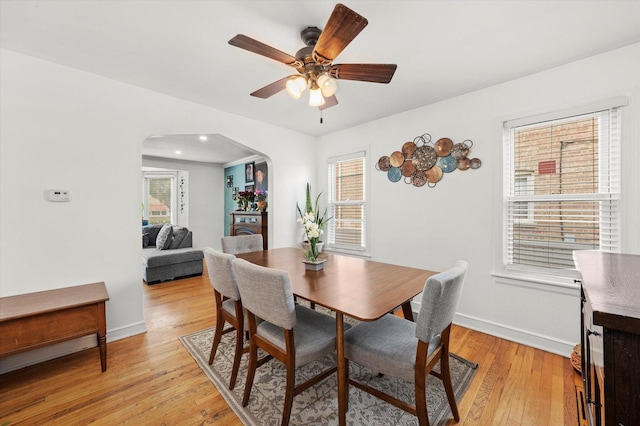 9141 S Albany Ave S, Evergreen Park, IL 60805 - dining area with arched walkways, light wood-style floors, baseboards, a ceiling fan, and recessed lighting