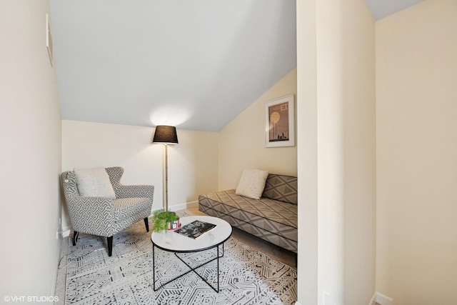 3721 N Sheffield Ave Unit B2, Chicago, IL 60613 - carpeted living room featuring lofted ceiling and baseboards