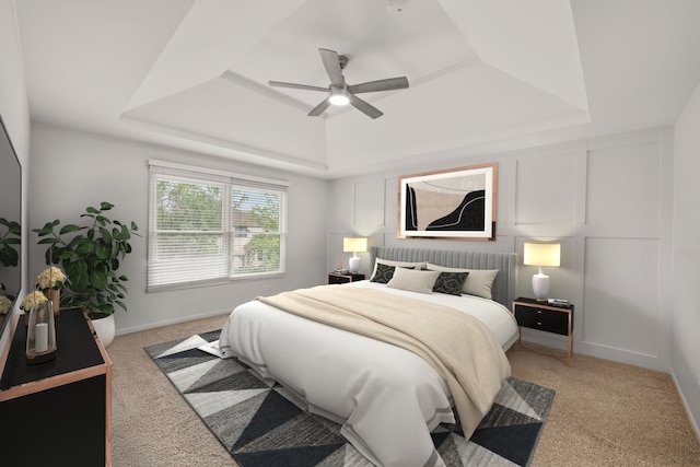1215 Pendleton Dr, Lemont, IL 60439 - bedroom with a tray ceiling, light colored carpet, a ceiling fan, and baseboards