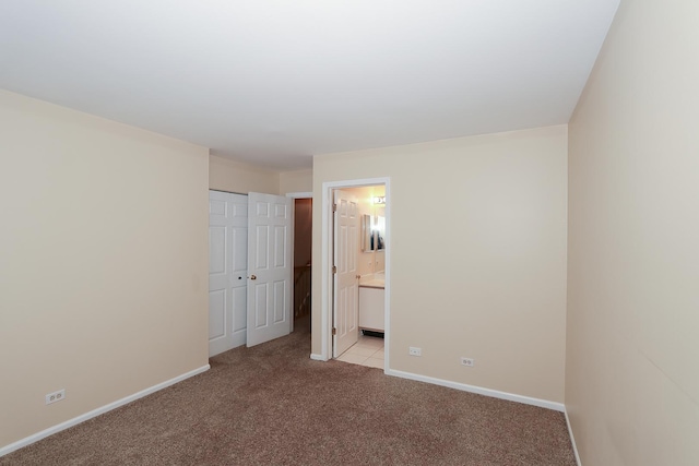 1379 Grandview Ct, Algonquin, IL 60102 - unfurnished bedroom with light colored carpet, baseboards, connected bathroom, and a closet