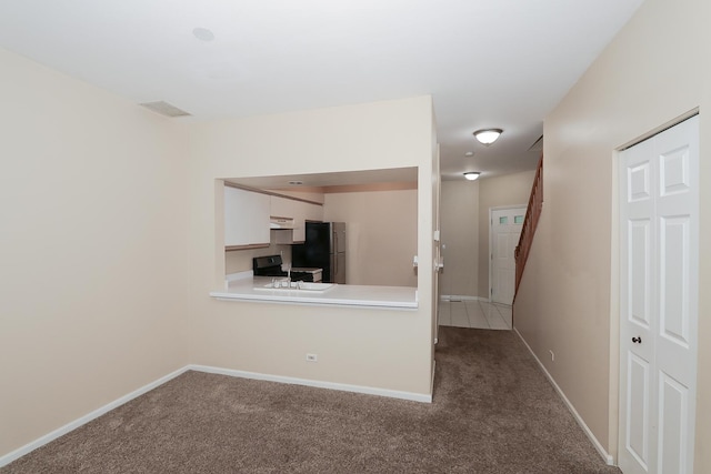 1379 Grandview Ct, Algonquin, IL 60102 - unfurnished living room featuring a sink, carpet floors, and baseboards